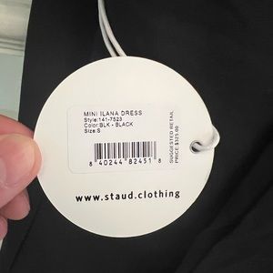 Ties at back neckline.